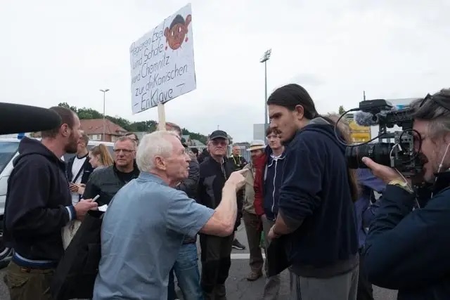 Activists clash over immigration outside a town hall in Chemnitz, Germany, on Aug. 30.